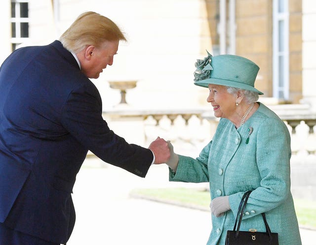 The Queen get an unusual handshake when she greets then-US President Donald Trump in 2019 