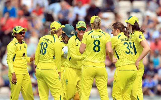 England’s Australia’s Georgia Wareham celebrates with team-mates after taking the wicket of England’s Sophia Dunkley during the second one day international of the Women’s Ashes Series at the Ageas Bowl, Southampton