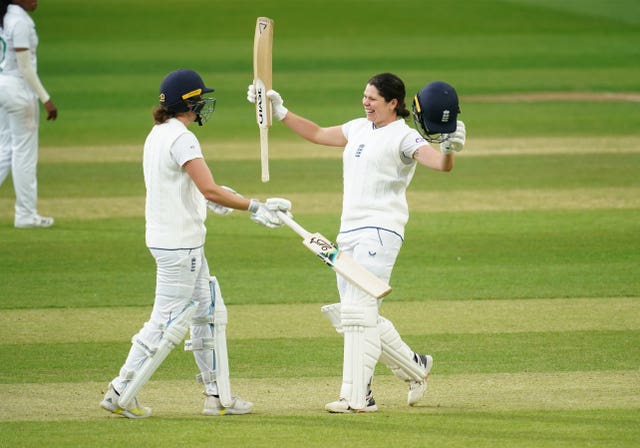 Davidson-Richards, right, celebrates with Natalie Sciver-Brunt after reaching a century on her England debut last summer
