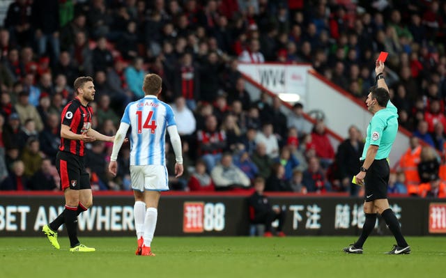 Bournemouth’s Simon Francis is shown the red card