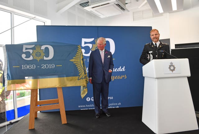 The Prince of Wales is introduced by chief constable Matt Jukes during a visit to the South Wales Police headquarters to celebrate their 50th anniversary in 2019