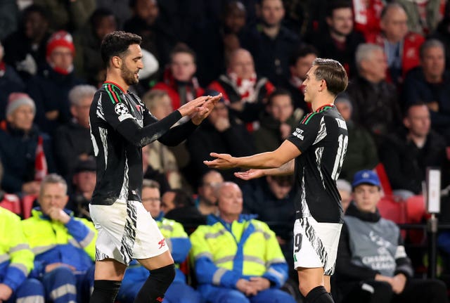 Mikel Merino, left, celebrates his goal with Leandro Trossard