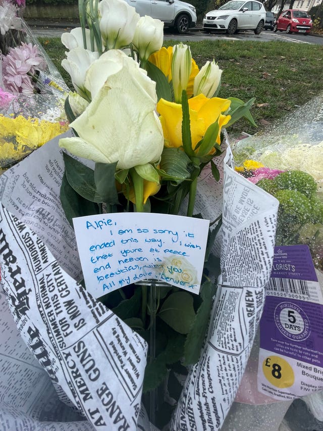 Tributes left on a bench on Broadgate Lane, Horsforth, following the incident
