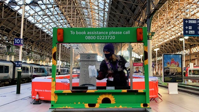 An assistance buggy being cleaned at Manchester Piccadilly station