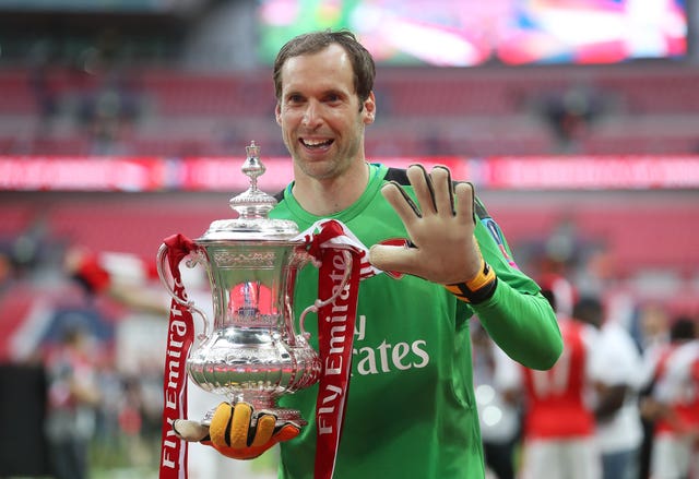 Petr Cech celebrates winning his fifth FA cup