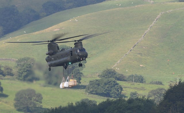 The RAF Chinook being used at the dam