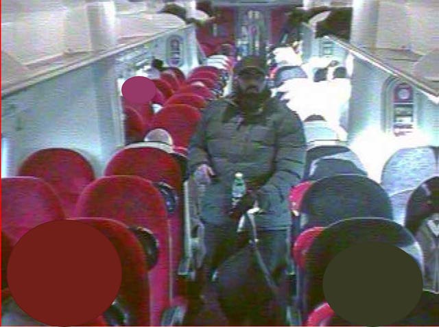 Usman Khan alone on the train to London