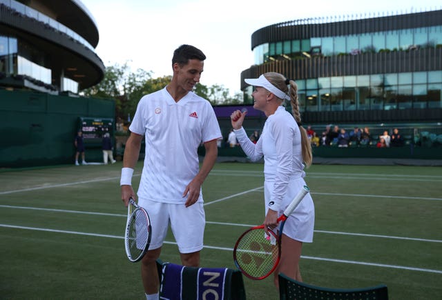 Joe Salisbury (left) and Harriet Dart had a late finish to their mixed doubles match