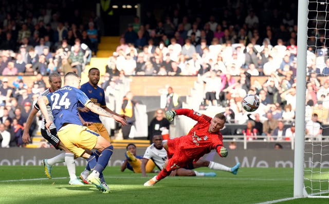 Miguel Almiron scores Newcastle's fourth goal against Fulham