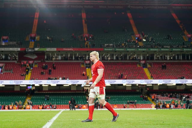 Aaron Wainwright walks across the Principality Stadium pitch