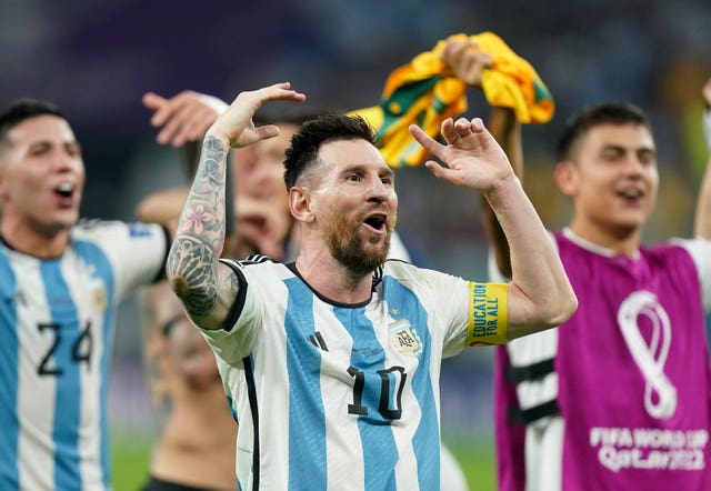Lionel Messi leads Argentina's celebrations after they beat Australia to reach the World Cup quarter-finals