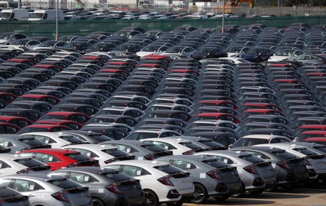 Honda cars lined up at docks 