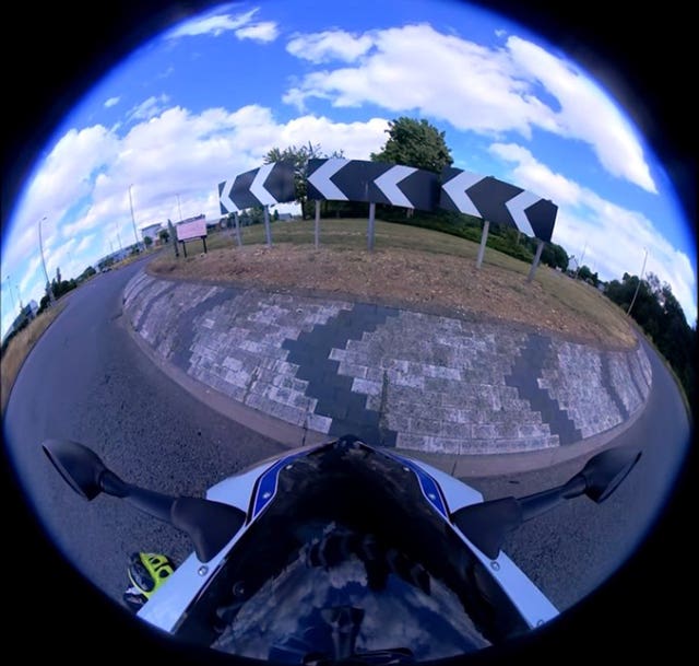 Camera footage recorded by motorcyclist Jack Godfrey stopping just short from a roundabout