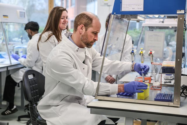 The Prince of Wales makes a mini extraction of DNA during a visit to the lab of 2024 Earthshot Prize finalist NatureMetrics in Guildford