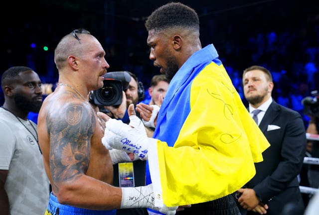 Joshua and Usyk exchange words