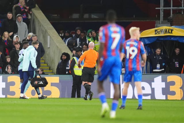 Bukayo Saka (left) goes off injured at Selhurst Park