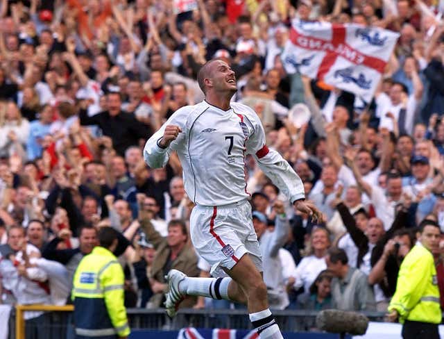 England captain David Beckham celebrates his last-gasp equaliser against Greece