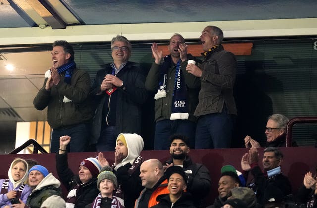 The Prince of Wales claps after Villa score