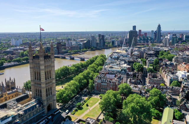 An aerial view of central London showing the Victoria Tower at the Palace of Westminster (left) and the Victoria Tower Gardens running along Millbank, Abingdon Street Gardens and Great College Street and Westminster School (bottom right) Lambeth Bridge leading to Lambeth Palace (left), and Vauxhall Bridge (top right)  