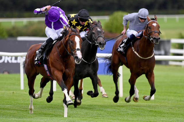 Diego Velazquez (left) coming home on top