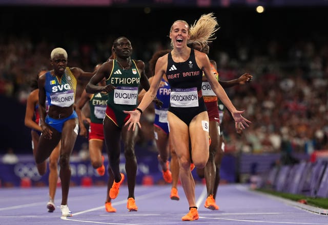 Keely Hodgkinson crosses the line to win Olympic gold