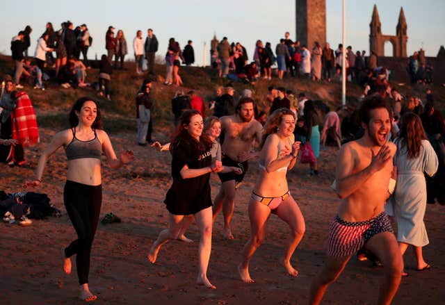 Students take the plunge (Jane Barlow/PA)