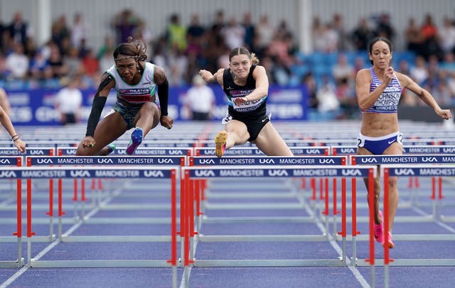 Katarina Johnson-Thompson (right) in action in the 100m hurdles 