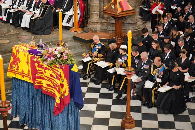 The royal family in front of the Queen's coffin