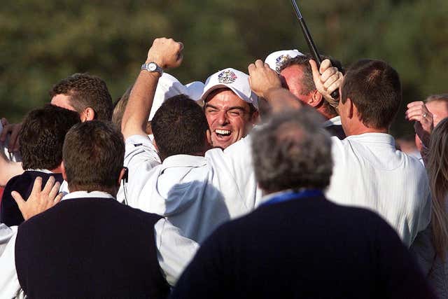 Paul McGinley, centre, sealed Europe's win