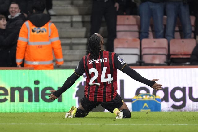 Antoine Semenyo slides on his knees to celebrate scoring a goal