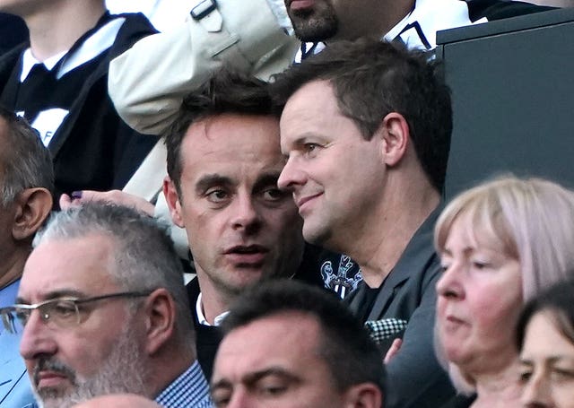 Television personalities Ant McPartlin, left, and Declan Donnelly watch their beloved Newcastle in action
