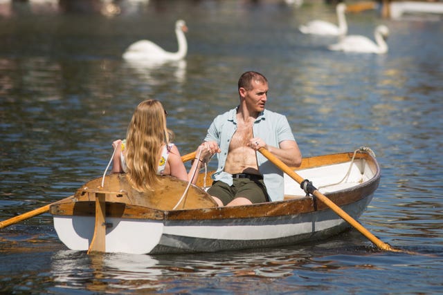 People take boat rides on the river Avon
