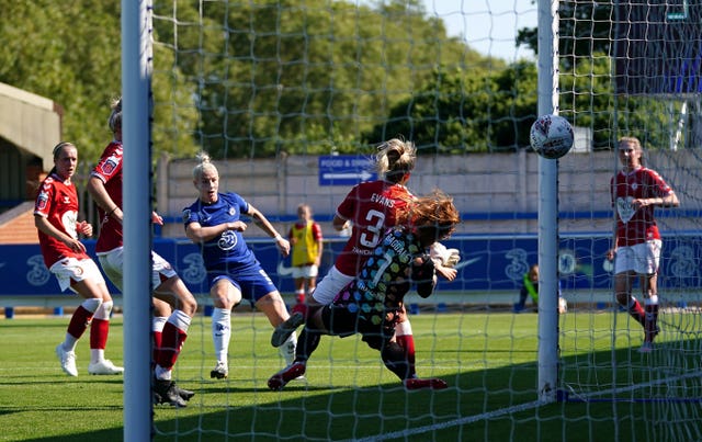 Bethany England, third left, scores Chelsea Women's sixth goal in Sunday's 9-0 win against Bristol City Women. Arsenal Women won 9-1 at 10-player West Ham Women on Saturday