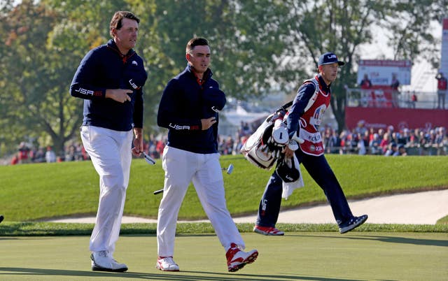 Mickelson (left) has developed a partnership with Rickie Fowler 