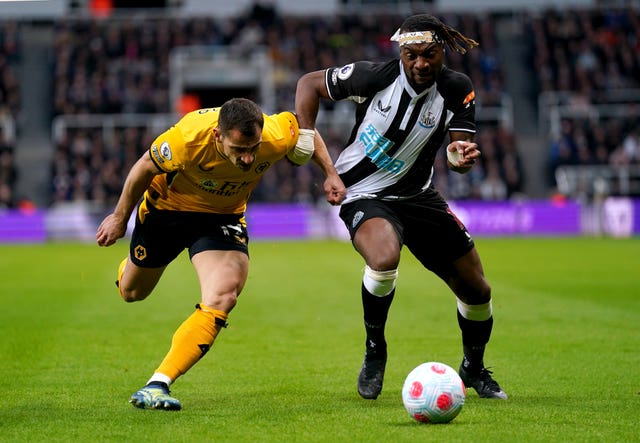 Newcastle United’s Allan Saint-Maximin (right) and Wolverhampton Wanderers’ Jonny Castro Otto battle for the ball during the Premier League match at St James’ Park, Newcastle. Picture date: Friday April 8, 2022