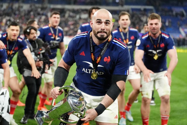 France forward Jean-Baptiste Gros celebrates with the Six Nations title