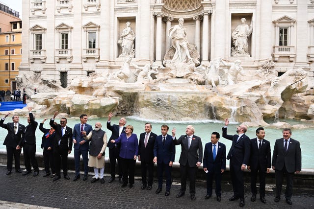 Prime Minister Boris Johnson (fifth right), joins G20 leaders during a visit to the Trevi fountain in Rome (Jeff J Mitchell/PA)