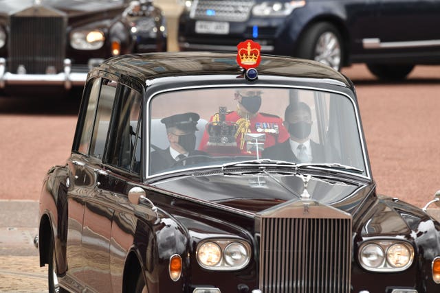 The Imperial State Crown leaves Buckingham Palace by car 