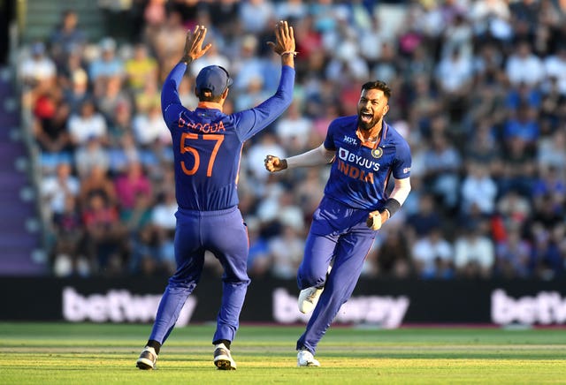 India’s Hardik Pandya, right, celebrates the wicket of England’s Liam Livingstone