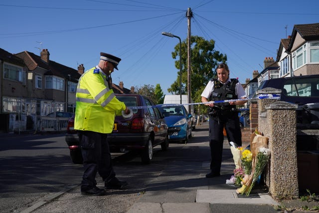 Police erect a cordon near the scene on Galpin’s Road, Thornton Heath, south London