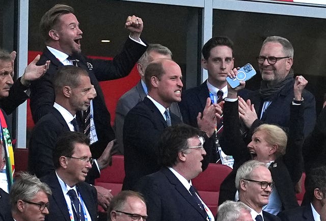 The Prince of Wales (centre) celebrates England winning the penalty shoot-out 