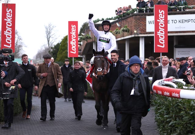 A jubilant Nico de Boinville celebrates aboard Constitution Hill