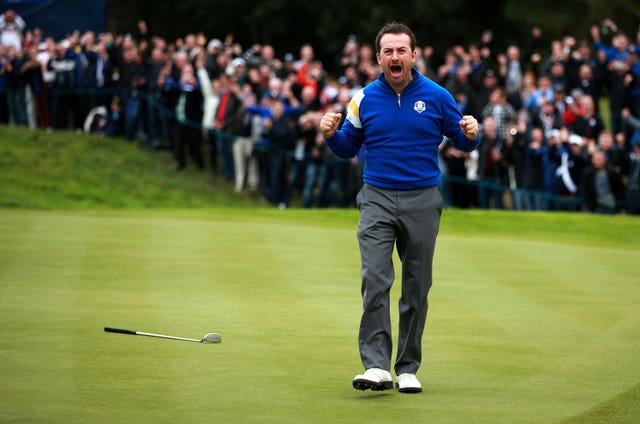 Europe's Graeme McDowell roars with delight after winning his singles match on day three of the 40th Ryder Cup at Gleneagles in September 2014. The hosts retained the trophy, defeating the United States by 16½ points to 11½, for their third consecutive win