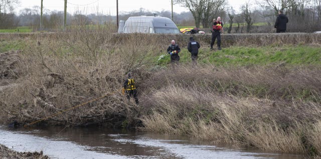 A police diving team at the River Wyre near St Michael’s on Wyre, Lancashire