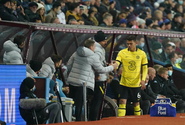 Thiago Silva is consoled by members of the Chelsea back room staff after being forced to come off with an injury against Aston Villa