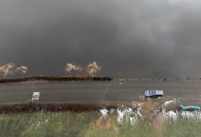 Flood waters cover a road near to Harbridge, Hampshire 