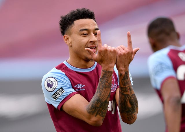 Jesse Lingard celebrates scoring against Arsenal