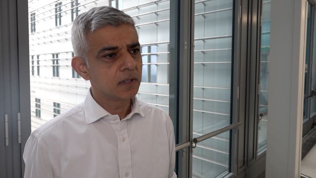 Sadiq Khan speaks to a journalist