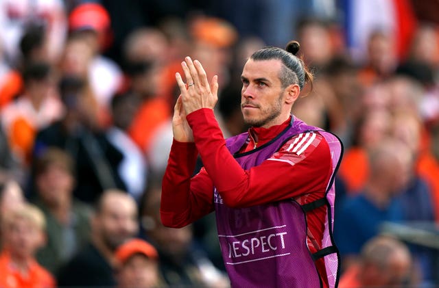 Gareth Bale applauds the fans