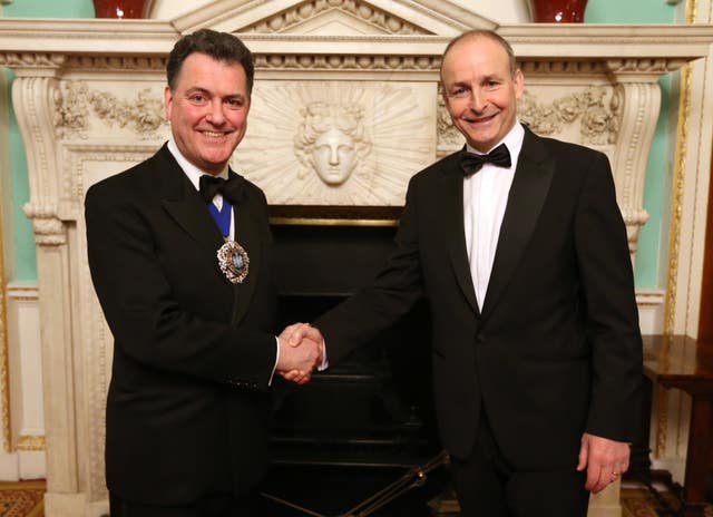 The Lord Mayor of the City of London Vincent Keaveny, left, welcomes Taoiseach Micheal Martin for a formal dinner at Mansion House in London 